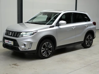 Suzuki Vitara 1.4 Boosterjet Style Smart Hybrid ✅Stoelverw.✅Trekhaak✅Panodak✅Dodehoek✅Adapt. Cruise✅Clima✅