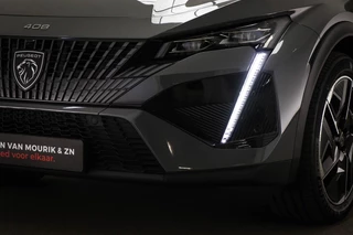 Peugeot e-408 GT 58 kWh | NIEUW | PANORAMADAK | STUURVERWARMING | MASSAGE | DAB | APPLE | 360 CAMERA / 23