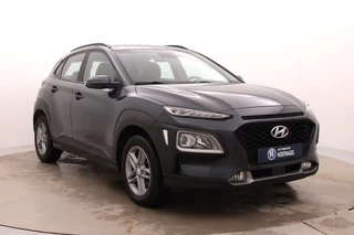 Hyundai Kona 1.0 T-GDI Comfort | Cruise control | Stuur & stoelverwarming | Camera | Parkeersensoren achter | Trekhaak / 7