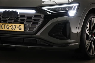 Audi Q8 Sportback e-tron 55 quattro Edition 115 kWh | PANORAMADAK | ACHTERBANKVERWARMING | AMBIENT LIGHTING | HEAD UP | B&O | TREKHAAK | 22" / 24