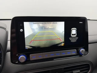 Hyundai Kona EV Fashion 64 kWh 3- Fase SOH 95,3% Warmtepomp | Trekhaak | Camera | Navigatie | Head-Up Display / 6