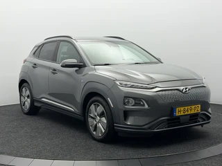 Hyundai Kona EV Premium 64 kWh SOH 90,1% Warmtepomp | Leer | Head-Up | Elektr. Stoelen | Adaptive Cruise / 10