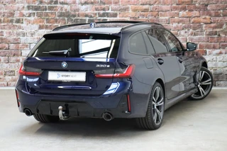 BMW 3 Serie Touring 330e High Executive M Sport Pakket Automaat  / Live Cockpit Professional / SOH 93 % / Driving Assistant / Panoramadak / Trekhaak / Leder / Harman Kardon / Innovation Pack / Parking Assistant / Travel Pack / Curved Display / 19 Inch / Shadow Line / 5