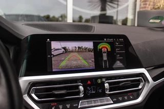 BMW 3-serie Touring 320e High Executive Sport Line | 1e eigenaar | NL auto | Driving Assistant | HiFi audio | LED | 18 inch | Stoelverwarming | DAB | Carplay | Navigatie | PDC / 28