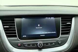 Opel Grandland X 1.6 Turbo 300pk Hybrid4 Elegance | Navigatie | Keyless | Camera | Parelmoer kleur | Electrische achterklep | Lichtmetalen velgen | AGR Comfortstoelen | Voorruitverwarming | Zwart dak / 37