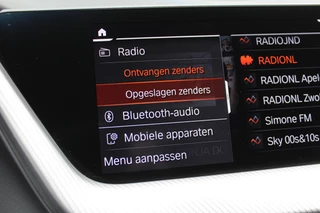 BMW 1 Serie 118i Business Edition  | M-Sport | Origin NL | Camera | Trekhaak | Navigatie / 21