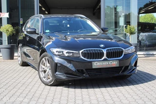 BMW 3-serie Touring 320e xDrive/Led/Trekhaak/Navi/Tel/All seas/ / 7