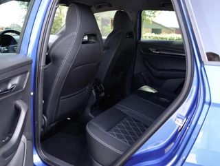 Skoda Karoq 1.5 TSI Sportline 150PK DSG Camera ACC Navi Stoel/Stuurverw. Race Blue 19 inch / 9