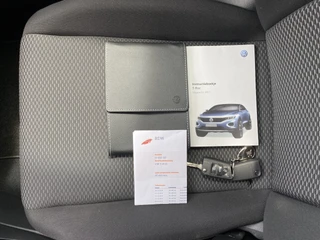 Volkswagen T-Roc 1.0 TSI Style 116 pk  | adaptieve cruise control | navigatie | parkeersensoren | all season banden | climate control / 34