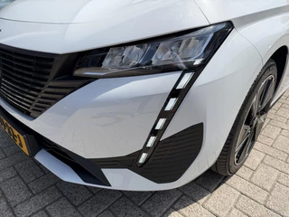 Peugeot e-308 SW Style EV 54 kWh | Demo Auto | Tot 8 jaar Garantie | Tot 420 Km WLTP | Navigatie via Telefoon | Warmtepomp | 18" Lichtmetalen Velgen | Adaptieve Cruise Control met Drive Assist | Full LED Verlichting | Climate Control | DAB Radio | Apple Carplay/Android Auto. / 39