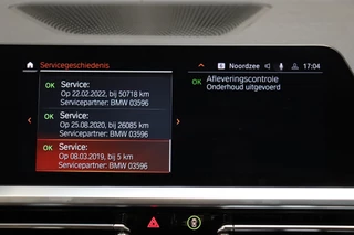 BMW 3 Serie Sedan 330i High Executive M Sport Pakket Automaat  / Live Cockpit Professional / Head-Up Display / Leder / Harman Kardon / LED / Stoelverwarming / Driving Assistant / Achteruitrijcamera / M Sportremsysteem / DAB / Ambiance Verlichting / 24