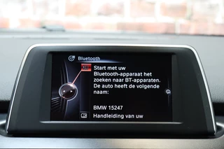 BMW 2 Series Active Tourer 218i Executive Automaat  / Trekhaak / Parkeersensoren / Stoelverwarming / Navigatie / Cruise Control / Bluetooth / Climate Control / LED / Sportstoelen / Multifunctioneel Stuurwiel / 17 Inch / 23