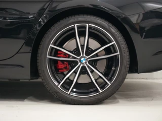 BMW 3 Serie Touring M340i xDrive Panoramadak | M-Stoelen | Harman Kardon | CoPilot / 42