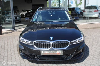 BMW 3-serie Touring 320e xDrive/Led/Trekhaak/Navi/Tel/All seas/ / 6