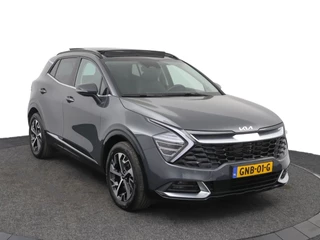 Kia Sportage 1.6 T-GDi Hybrid DynamicPlusLine  - Kantel/Schuifdak - Stoel en stuur verwarming - Parkeersensoren - Navigatie- Fabrieksgarantie tot 10-2031 / 12