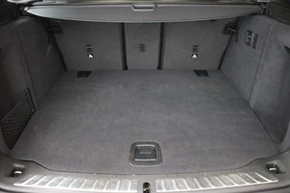 BMW iX3 High Executive 80 kWh Automaat  / Driving Assistant Professional / SOH 97% / Live Cockpit Professional / Trekhaak / Panoramadak / Adaptief Onderstel / Leder / Harman Kardon / Shadow Line / Head-Up Display / Adaptieve LED-koplampen / DAB / 20 Inch / 49