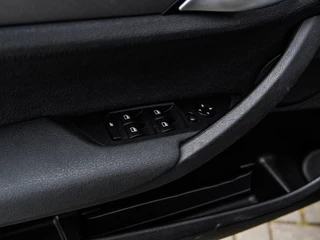BMW X1 SDrive18i M-sport | Panoramadak | Leder | Xenon | Navi | Harman&Kardon | Stoelverwarming | Climate control / 28
