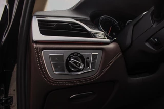 BMW 7-serie 740i High Executive | 2e eigenaar | Driving Assistant Plus | Innovation pakket | Massage | Dodehoekdetectie | Adaptieve cruise | 360 camera | Stoelventilatie | Gesture control / 42
