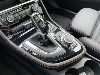 BMW 2 Serie Active Tourer 220i High Executive Edition 192 pk M-sport AUT. | dealer onderhouden | navigatie | trekhaak | panoramadak / 35