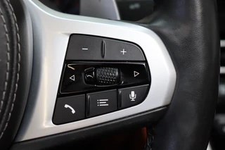 BMW 8 Serie M850i xDrive High Executive M Sport Pakket Automaat  / Live Cockpit Professional / Individual Leder Merino / Driving Assistant / Carbon Exterieur / Active Steering / Laserlight / M Sportremsysteem / Active Cruise Control met Stop en Go-functie / M Sportdifferentieel / Shadow Line / Achteruitrijcamera / Harman Kardon / 48