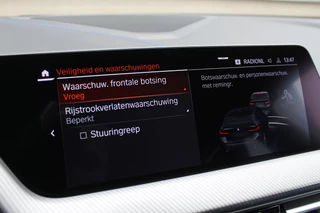 BMW 1 Serie 118i Business Edition  | M-Sport | Origin NL | Camera | Trekhaak | Navigatie / 35