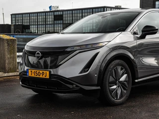 Nissan Ariya Evolve 91 kWh | SOH 99% | Panoramadak | Trekhaak | ACC | HUD | Voorstoelen verwarmd en geventileerd | Warmtepomp | 360 Camera | 19" / 55