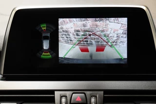 BMW 2 Series Active Tourer 218i Executive Automaat  / Navigatie / Trekhaak / Panoramadak / LED / Achteruitrijcamera / Climate Control / Parkeersensoren voor+achter / Cruise Control / Bluetooth / 18
