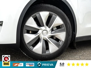 Tesla Model Y Long Range AWD SoH 91,1%| 513 pk | 2023 | Trekhaak | Panorama | Dealer onderhouden / 15