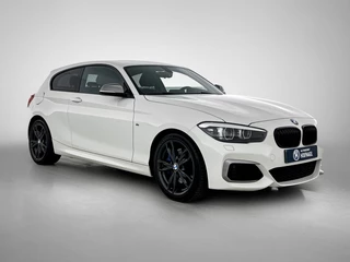 BMW 1-serie M140i xDrive | Stoelverwarming | Cruise Control | Navigatie / 7