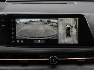 Nissan Ariya Evolve 91 kWh | SOH 99% | Panoramadak | Trekhaak | ACC | HUD | Voorstoelen verwarmd en geventileerd | Warmtepomp | 360 Camera | 19" / 38