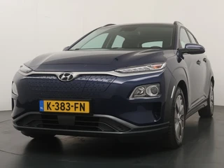 Hyundai Kona EV Comfort 64 kWh - SOH 94,5%  - Airco - Keyless Entry - Apple CarPlay/Android Auto - Achteruitrijcamera - Virena Zekerheidspakket €895,- / 2