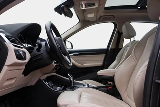 Bmw X1 sDrive20i Orange Edition 192PK Pano | Leder | HUD | Stoelverwarming / 12