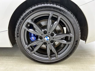 BMW 1-serie M140i xDrive | Stoelverwarming | Cruise Control | Navigatie / 10