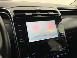 Hyundai Tucson 1.6 T-GDI MHEV Comfort Smart | Automaat | Adaptive cruise | Stoelverwarming | CarPlay | Camera / 24