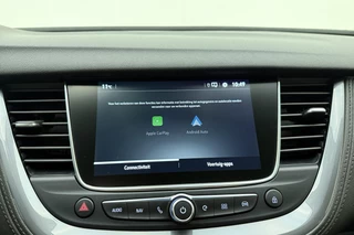 Opel Grandland X 1.6 Turbo 300pk Hybrid4 Elegance | Navigatie | Keyless | Camera | Parelmoer kleur | Electrische achterklep | Lichtmetalen velgen | AGR Comfortstoelen | Voorruitverwarming | Zwart dak / 36