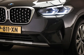 BMW X4 xDrive20i Business Edition Plus | PANORAMADAK | HEAD UP | HOUTAFWERKING | STUURVERWARMING | 19" / 20