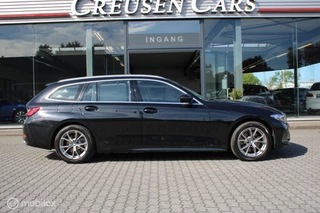 BMW 3-serie Touring 320e xDrive/Led/Trekhaak/Navi/Tel/All seas/ / 9