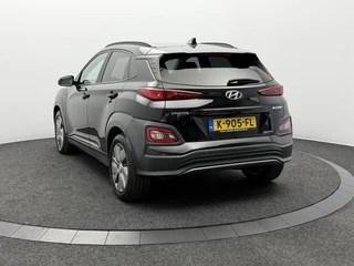 Hyundai Kona EV Fashion 64 kWh 3- Fase SOH 95,3% Warmtepomp | Trekhaak | Camera | Navigatie | Head-Up Display / 8