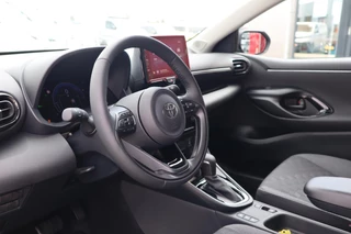 Toyota Yaris HYBRID 115 FIRST EDITION STOEL/STUURVERW DRAADLOOS-LADEN APPLE/ANDROID KEYLESS CLIMA AD-CRUISE 16" LM-VELGEN / 14