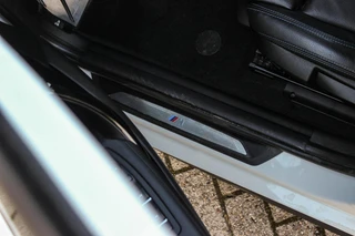 BMW 1-serie 120i Edition M Sport Shadow High Executive | 2e eigenaar | Driving Assistant | Schuif-/kanteldak | Camera | Harman Kardon | Keyless entry | LED | M sport remmen | PDC / 35