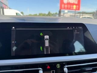 BMW 3-serie Touring 320e High Executive *Laser Koplampen* / 32