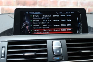 BMW 1 Series 118i Executive M Sport Pakket 5 deurs / Navigatie Professional / LED / Trekhaak / 18 Inch / Climate Control / Hifi / Parkeersensoren / Cruise Control / Extra Getint Glas / Bluetooth / Shadow Line / 23