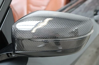 BMW 8 Serie M850i xDrive High Executive M Sport Pakket Automaat  / Live Cockpit Professional / Individual Leder Merino / Driving Assistant / Carbon Exterieur / Active Steering / Laserlight / M Sportremsysteem / Active Cruise Control met Stop en Go-functie / M Sportdifferentieel / Shadow Line / Achteruitrijcamera / Harman Kardon / 10