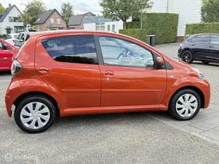 Toyota Aygo 1.0 VVT-i Comfort Orange AIRCO 5DRS TOERENTELLER / 7