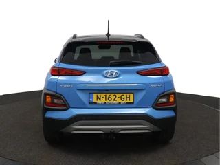 Hyundai Kona 1.0T Premium  - Elektrische Stoelen - Trekhaak - Stoelverwarming - Achteruitrijcamera - Climate Control - Apple Carplay/Android Auto - Virena Zekerheidspakket t.w.v. €895,- / 7