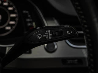 Audi Q7 3.0 TFSI quattro S-Line Panoramadak B&O Advanced Nachtzicht Luchtvering Leder ACC HUD Virtual Cockpit Soft-Close Achterasbesturing Trekhaak 21" / 24