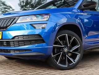 Skoda Karoq 1.5 TSI Sportline 150PK DSG Camera ACC Navi Stoel/Stuurverw. Race Blue 19 inch / 29