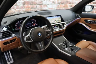 BMW 3 Serie Touring 320i High Executive M Sport Pakket Automaat  / Live Cockpit Professional / Cruise Control / Stoelverwarming / Active Guard Plus / Hifi / LED / Climate Control / Leder / 19 Inch / DAB / 12