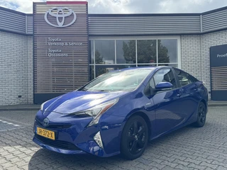 Toyota Prius 1.8 HYBRID FIRST EDITION NAVI STOELVERW AFN-TREKHAAK PARK-SENSOREN BSM CAMERA HUD BLUETOOTH