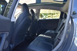Tesla Model Y Long Range AWD 75 kWh AMD Ryzen | Trekhaak | Leer | Panorama | 12 mnd BOVAG garantie | Whatsapp 06-53188999 / 7